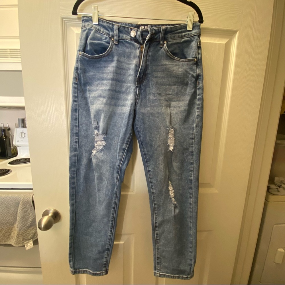 Distressed straight leg jean
